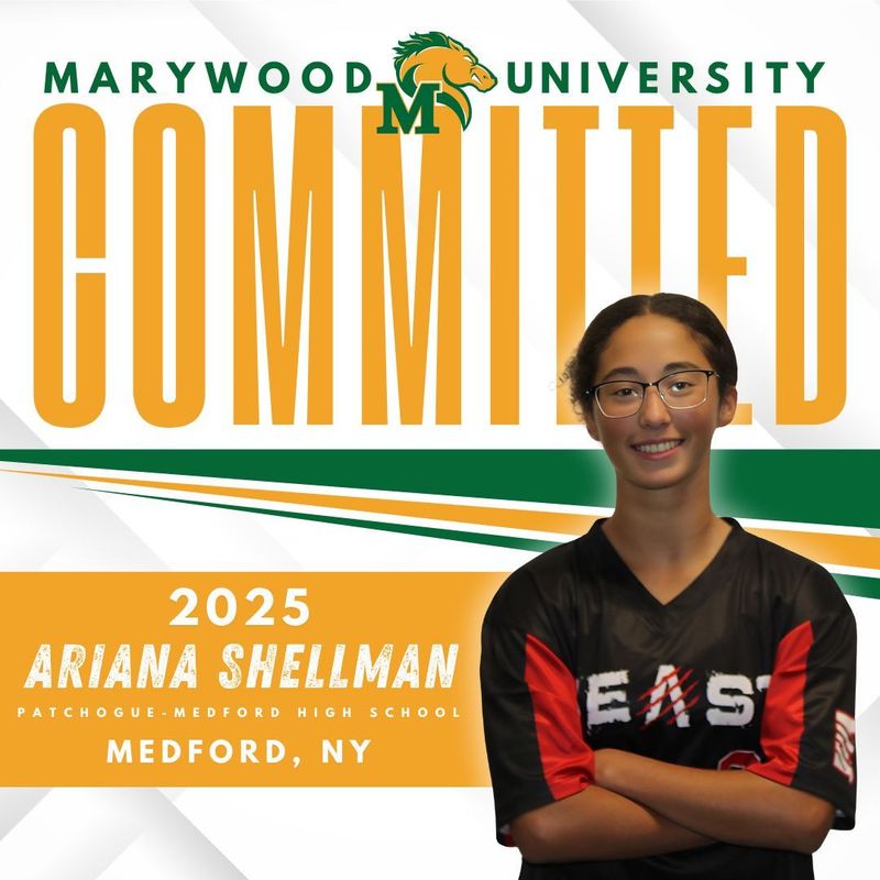 Ariana Shellman, class of 2025, commits to Marywood University. She is wearing a black East jersey with arms crossed.