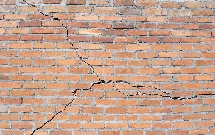 Cracked brick foundation