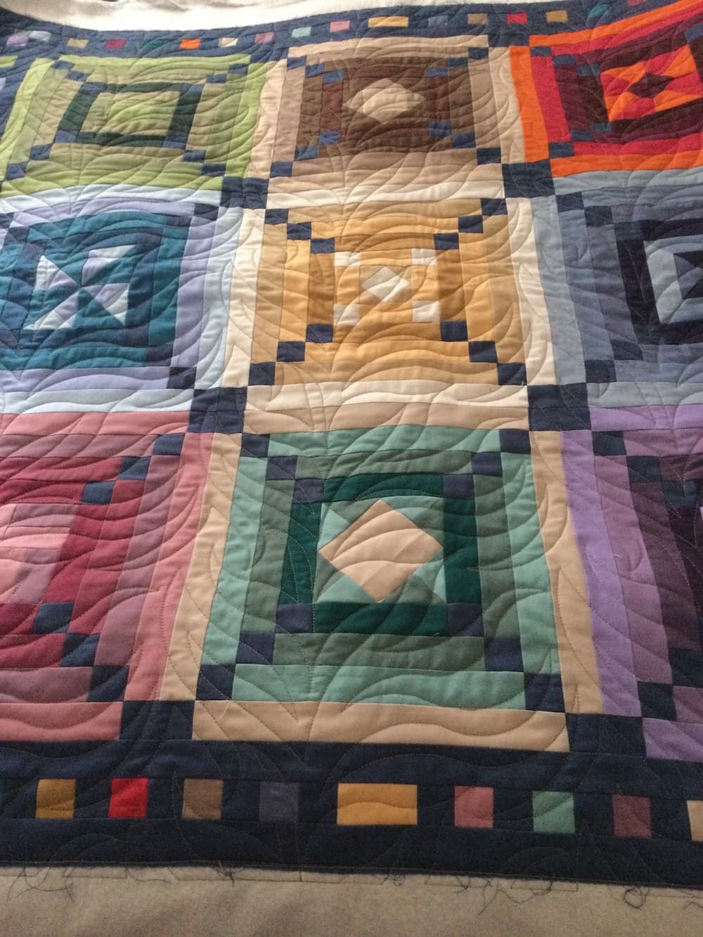Colourful Quilt With Square Blocks — Morning Star Quilting in Bateau Bay, NSW