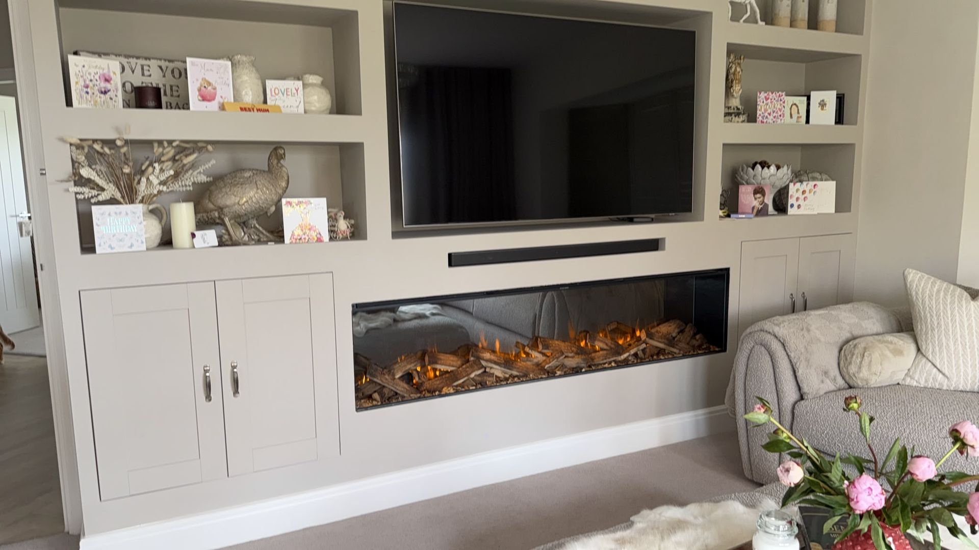 british fires electric fire in a media wall with shelving