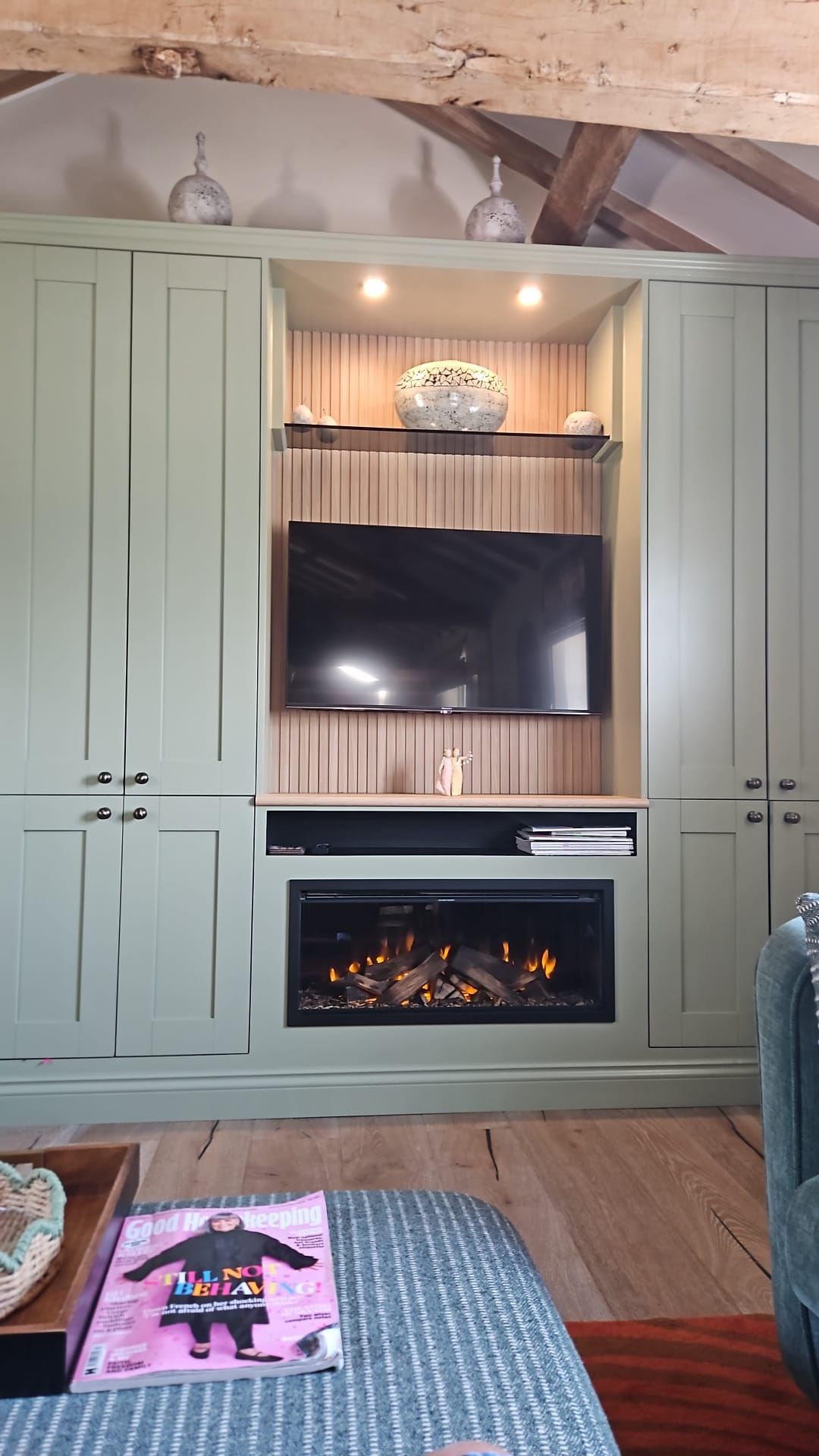 small electric fire in a media wall