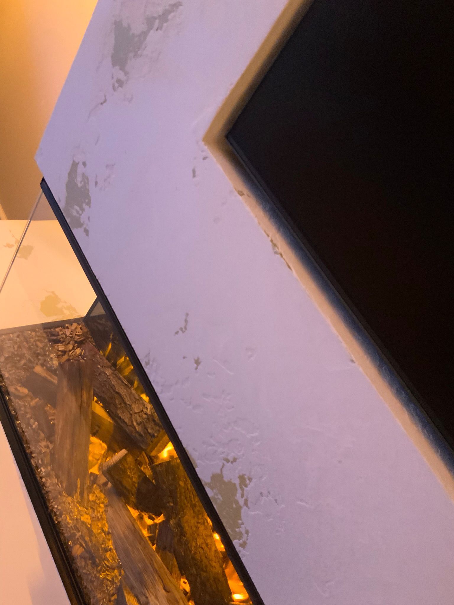 close up of media wall with venetian plaster
