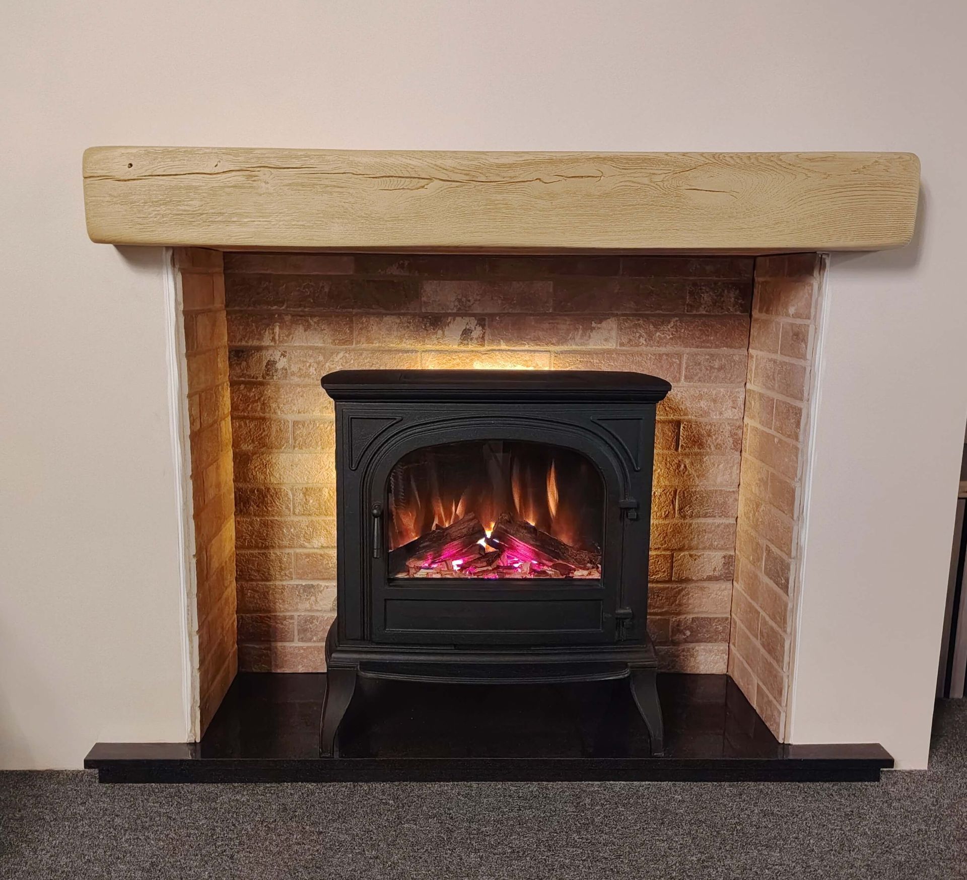 hinton stove with red brick chamber set and geocast beam on display