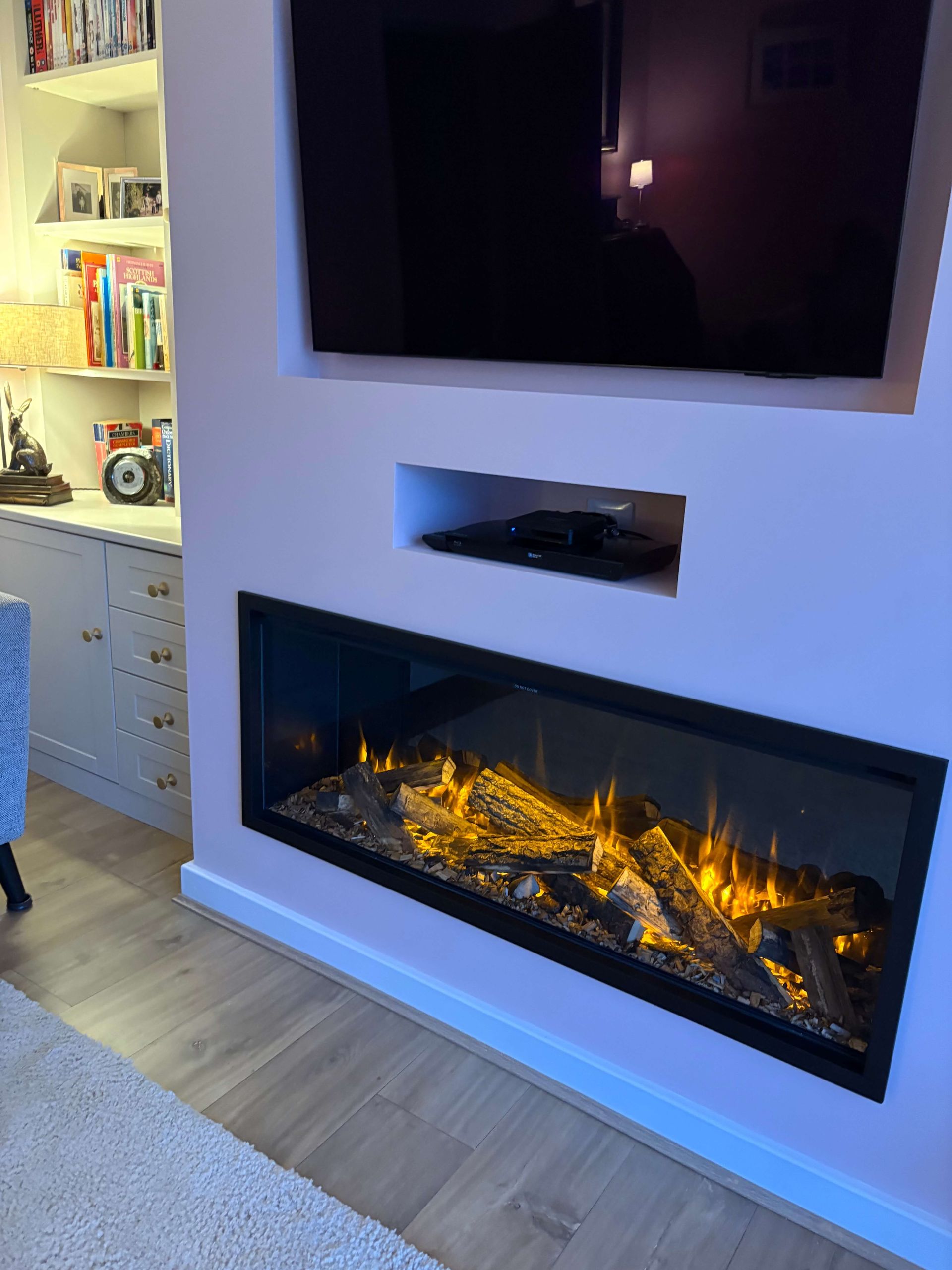 new forest 1200 electric fire in media wall with front facing trim