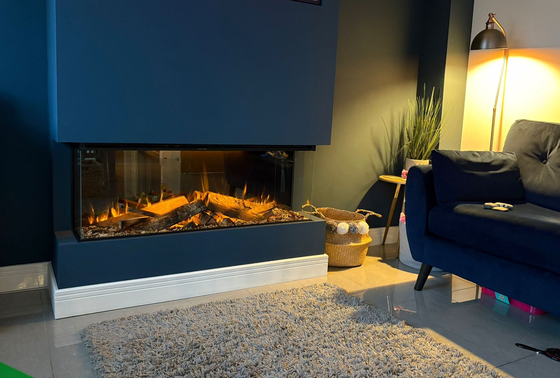 new forest 1200 electric fire with upgrades, in a blue media wall