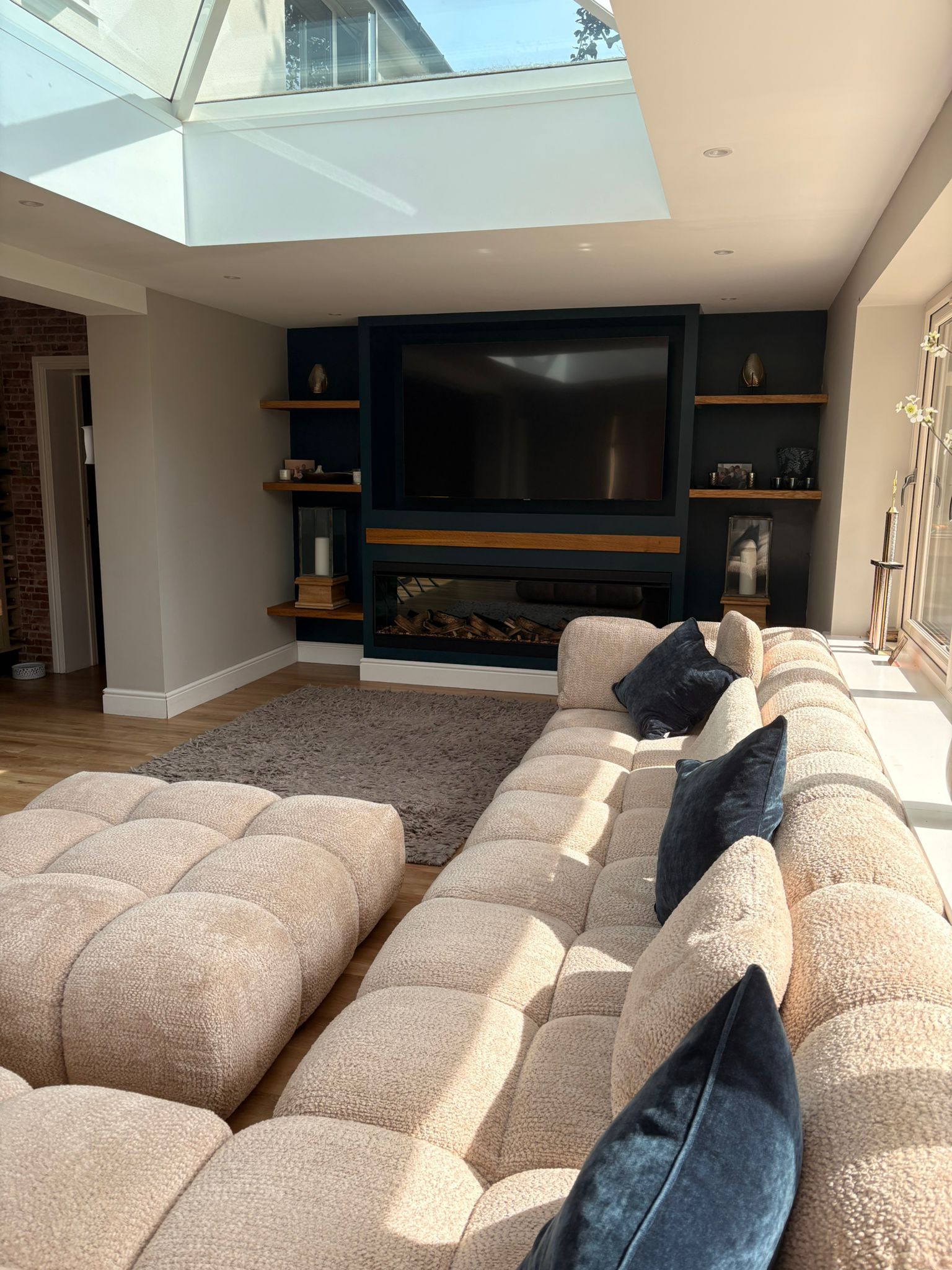 british fires new forest 1900 leectric fire with all upgrades in a dark blue and wooden media wall