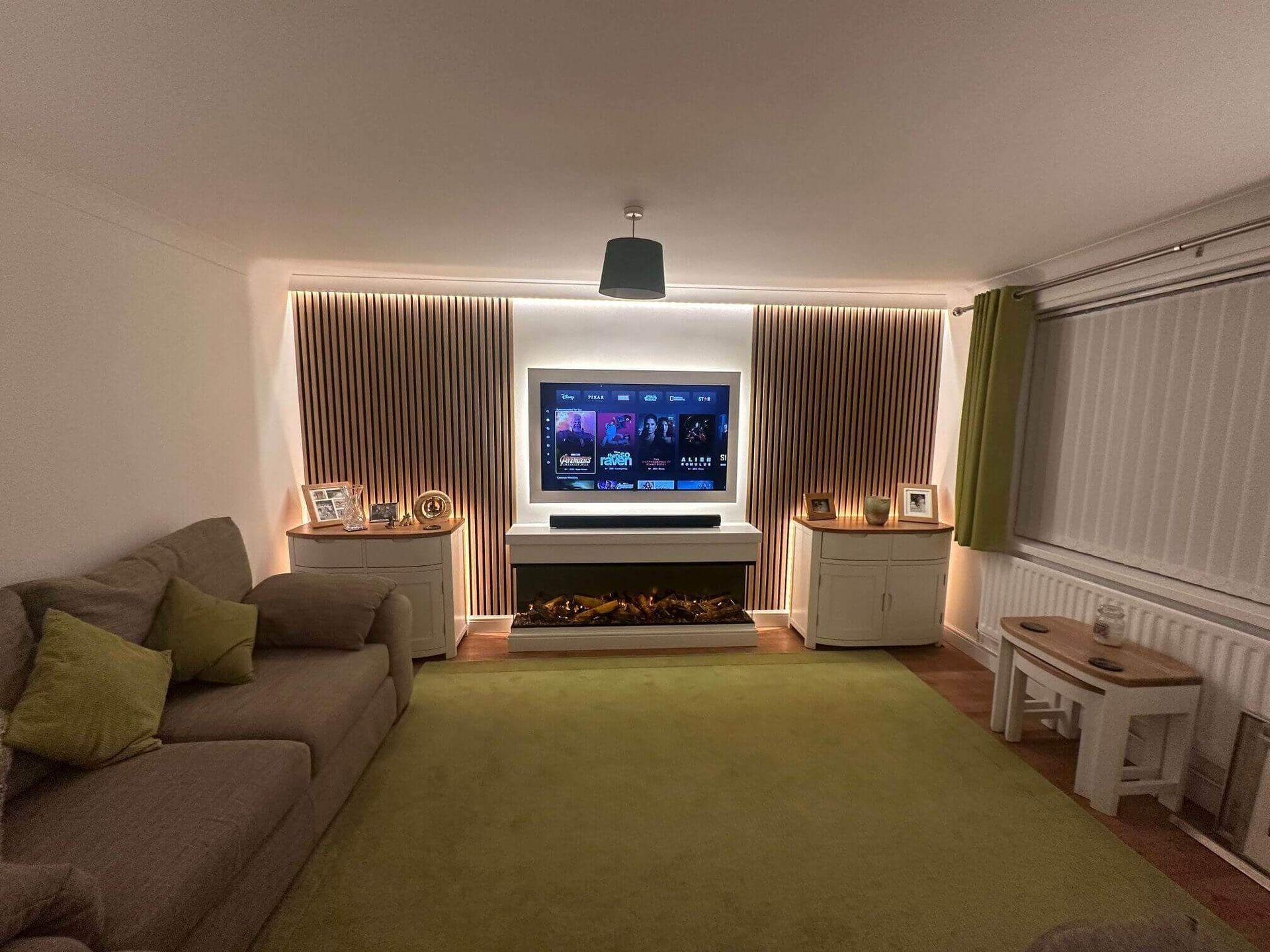 british fires electric fire in a custom made suite with slat wall