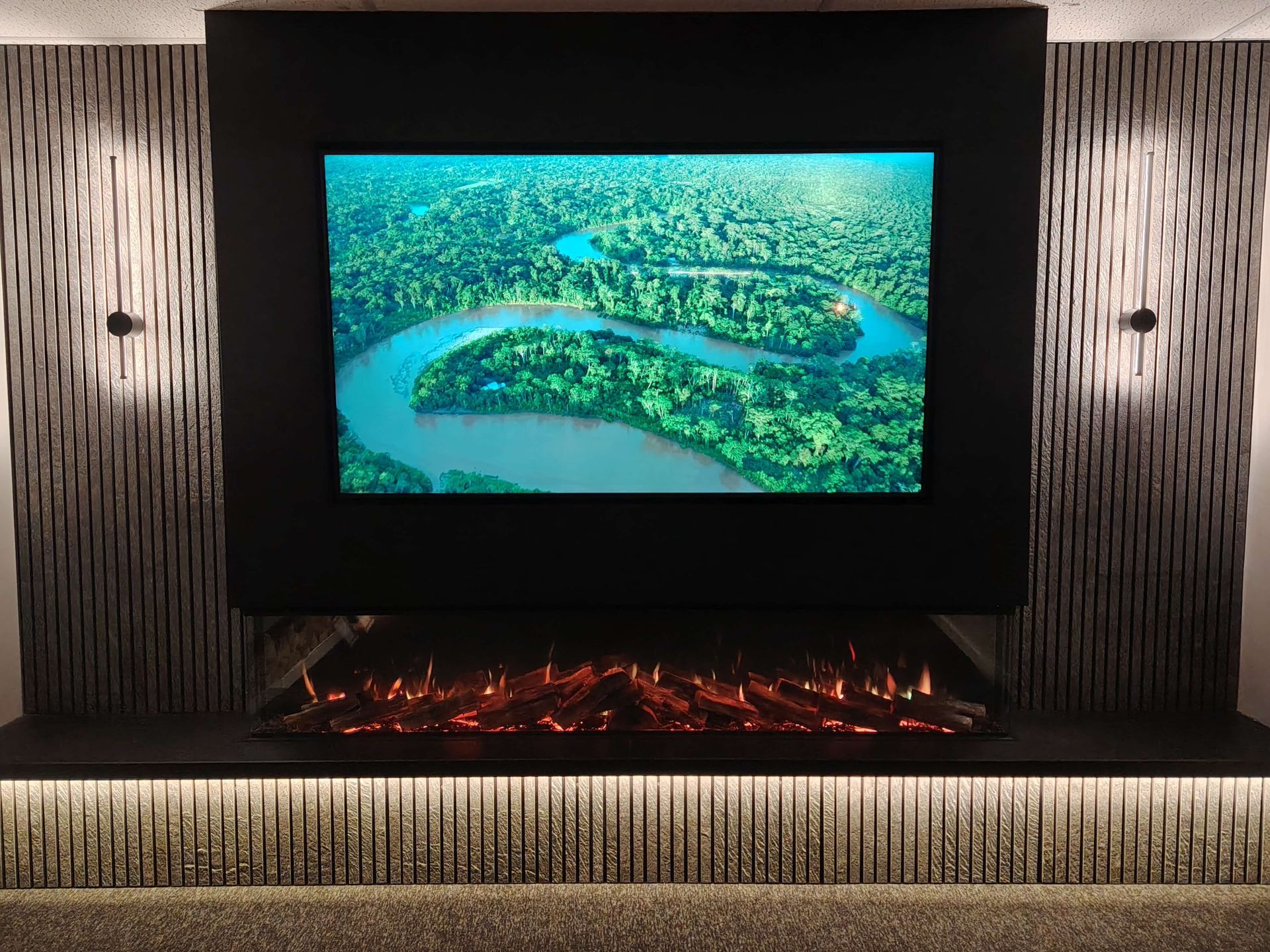 solus vs220 electric fire in our showroom with wall lights