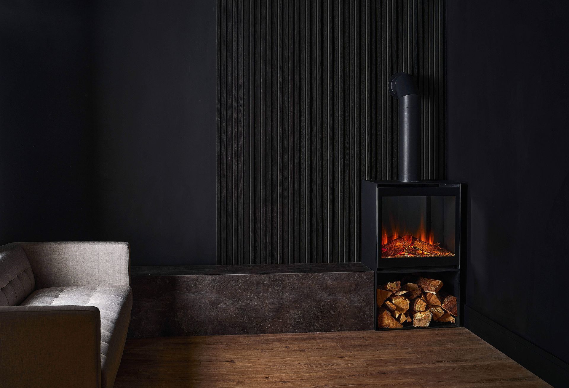 british fires cube stove with glass door and flue pip