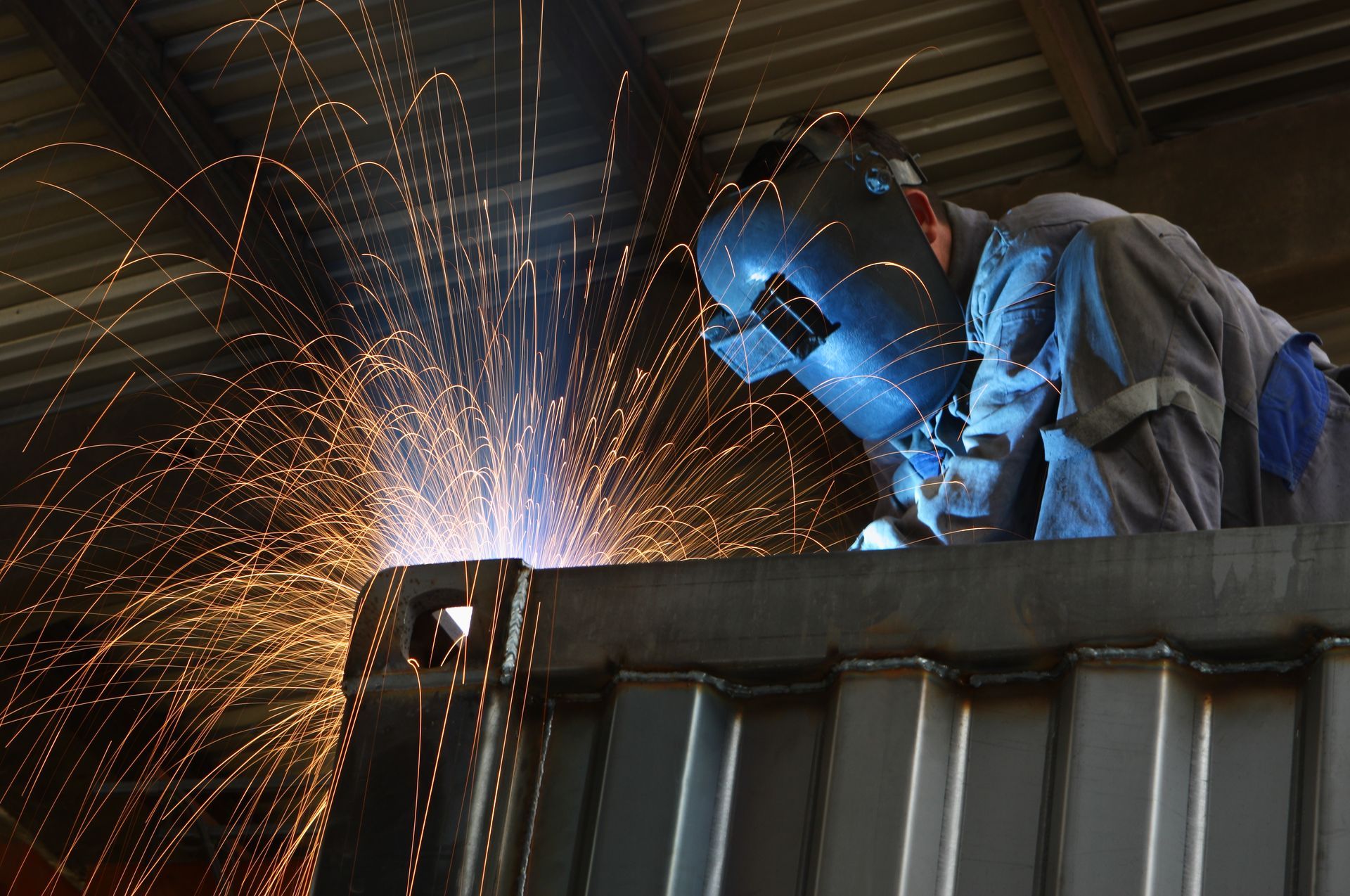Metal worker welding | Mechanical Fitting Solutions | industrial machinery in Newcastle, NSW