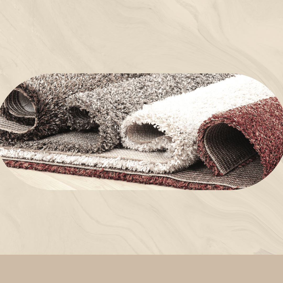 four carpets rolled up