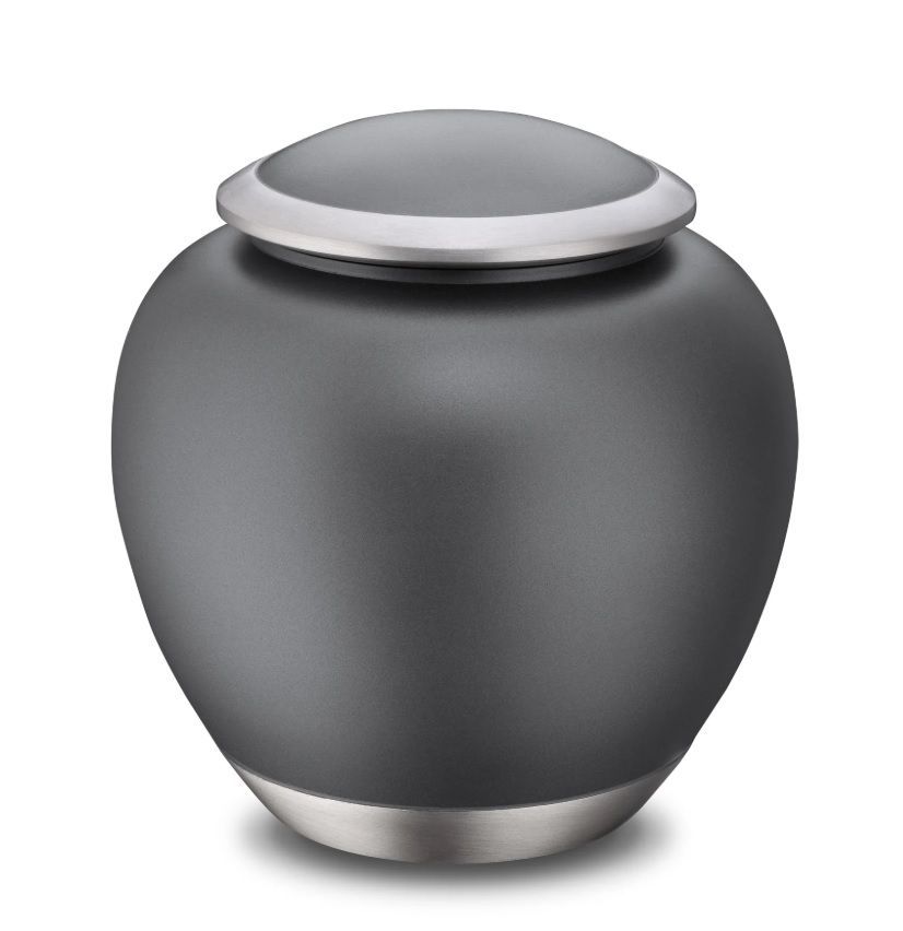 Gray cremation urn with a silver rim and base.