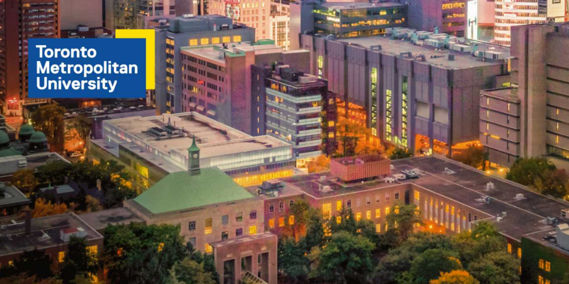 An aerial view of toronto metropolitan university at night.