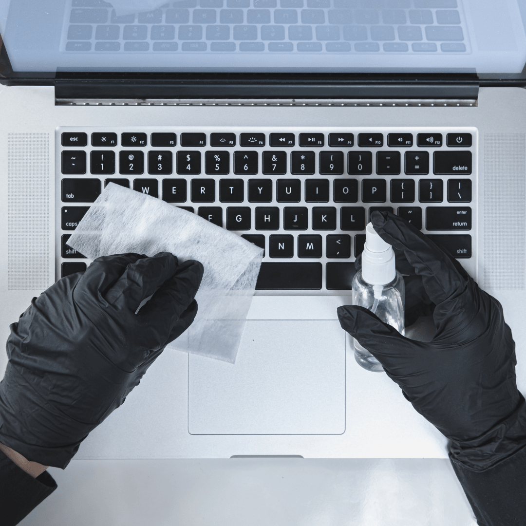 cleaning laptop keyboard with sanitizer
