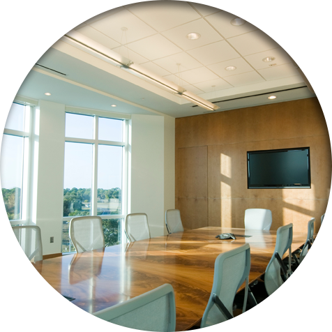 A conference room with neatly arranged office chairs