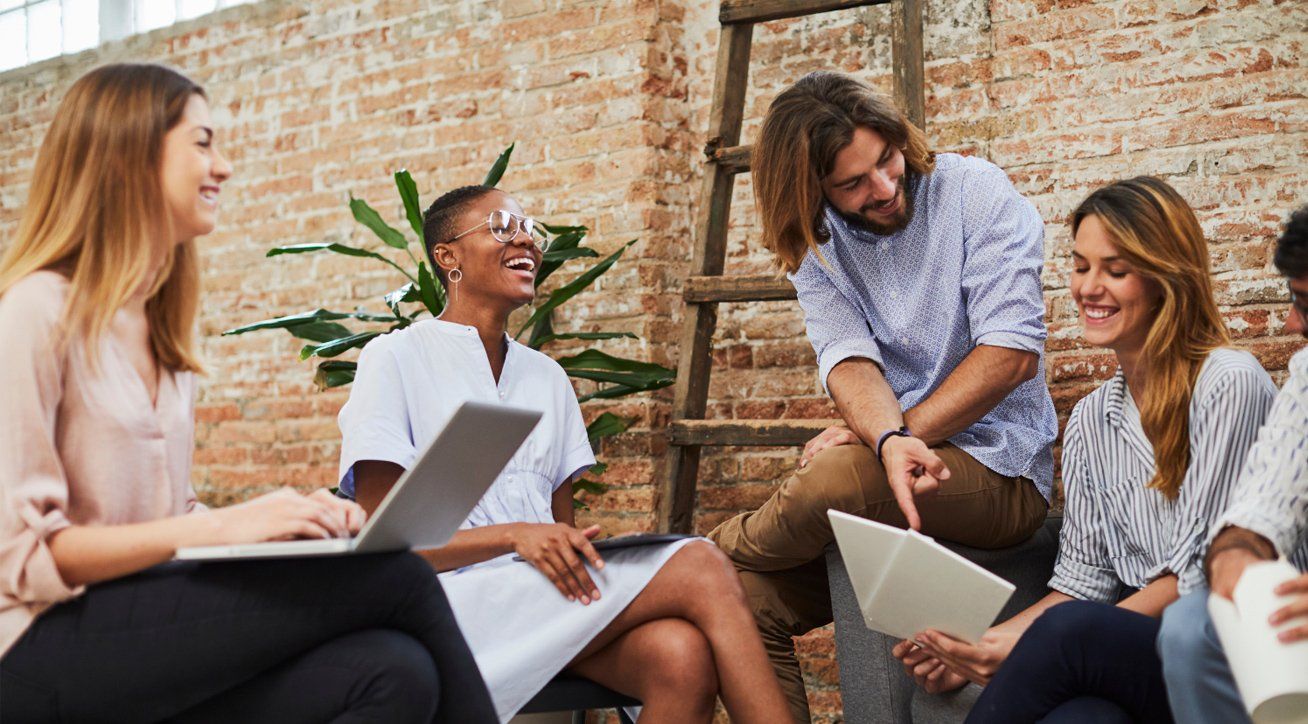 A group of employees having a productive meeting in the office