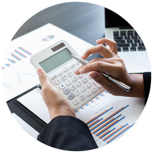 close-up of a school manager's hand calculating invoice using calculator