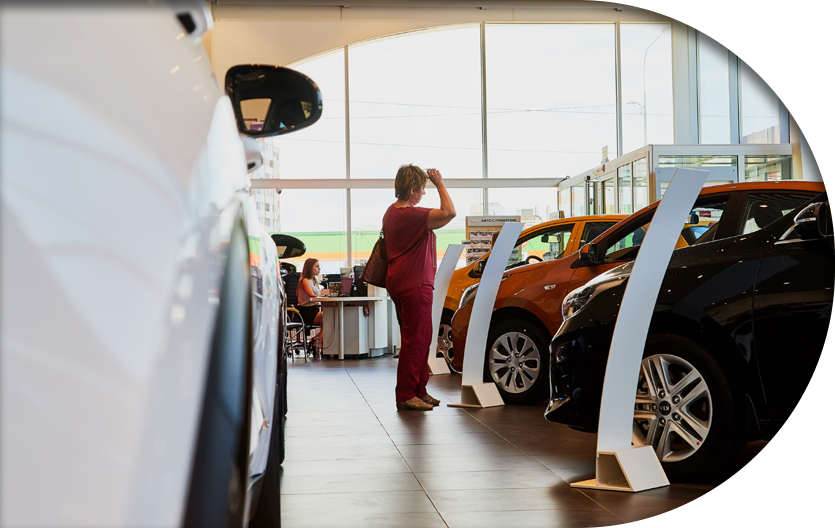 Customer of a clean car dealership looking around
