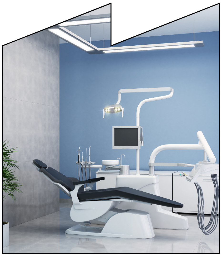 A dental office with a dental chair and a monitor