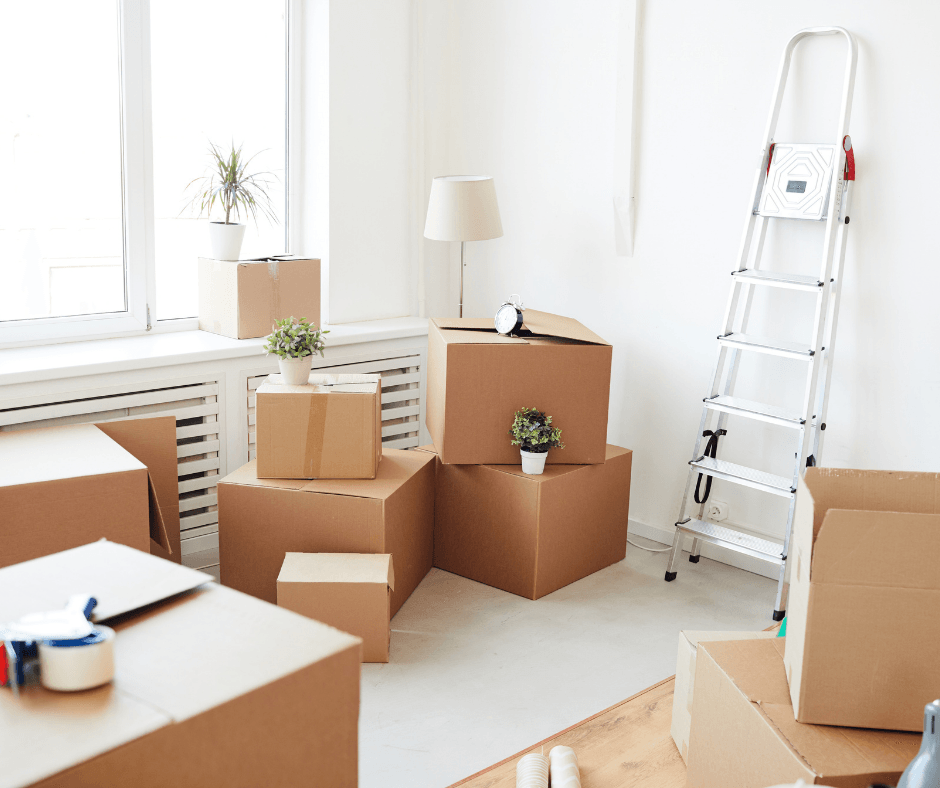 moving out of house with packed boxes