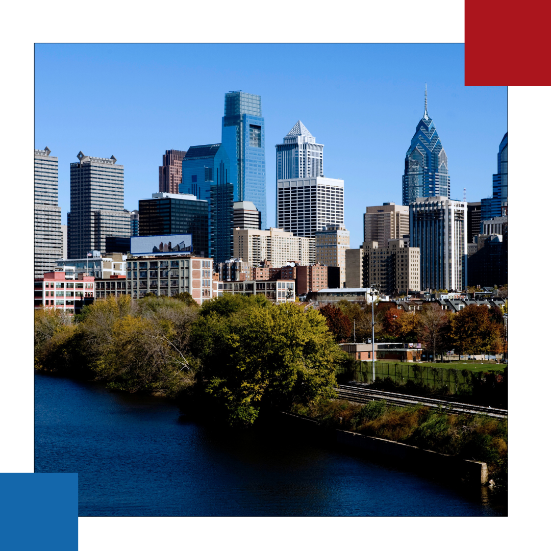 A city skyline with a Schuykill river in the foreground