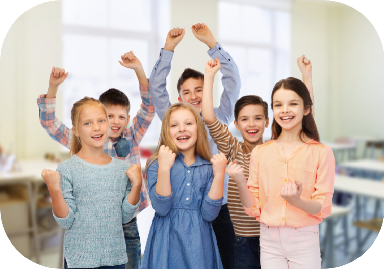 clean classroom with happy students smiling at the camera