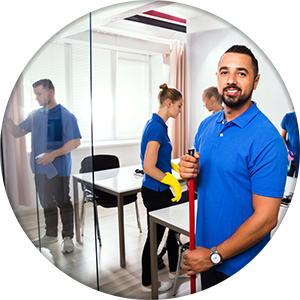 happy male janitor in office