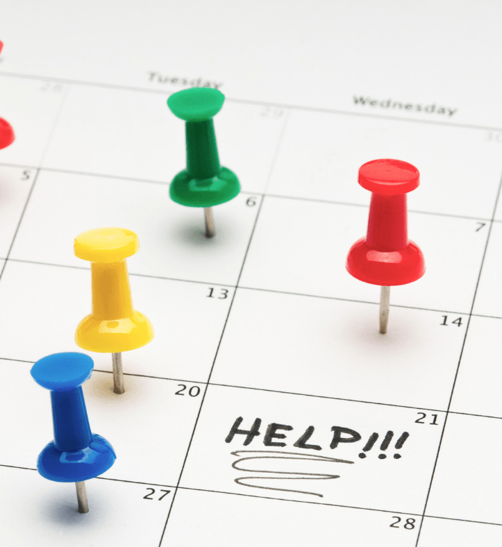 pinned calendar with help written on a date