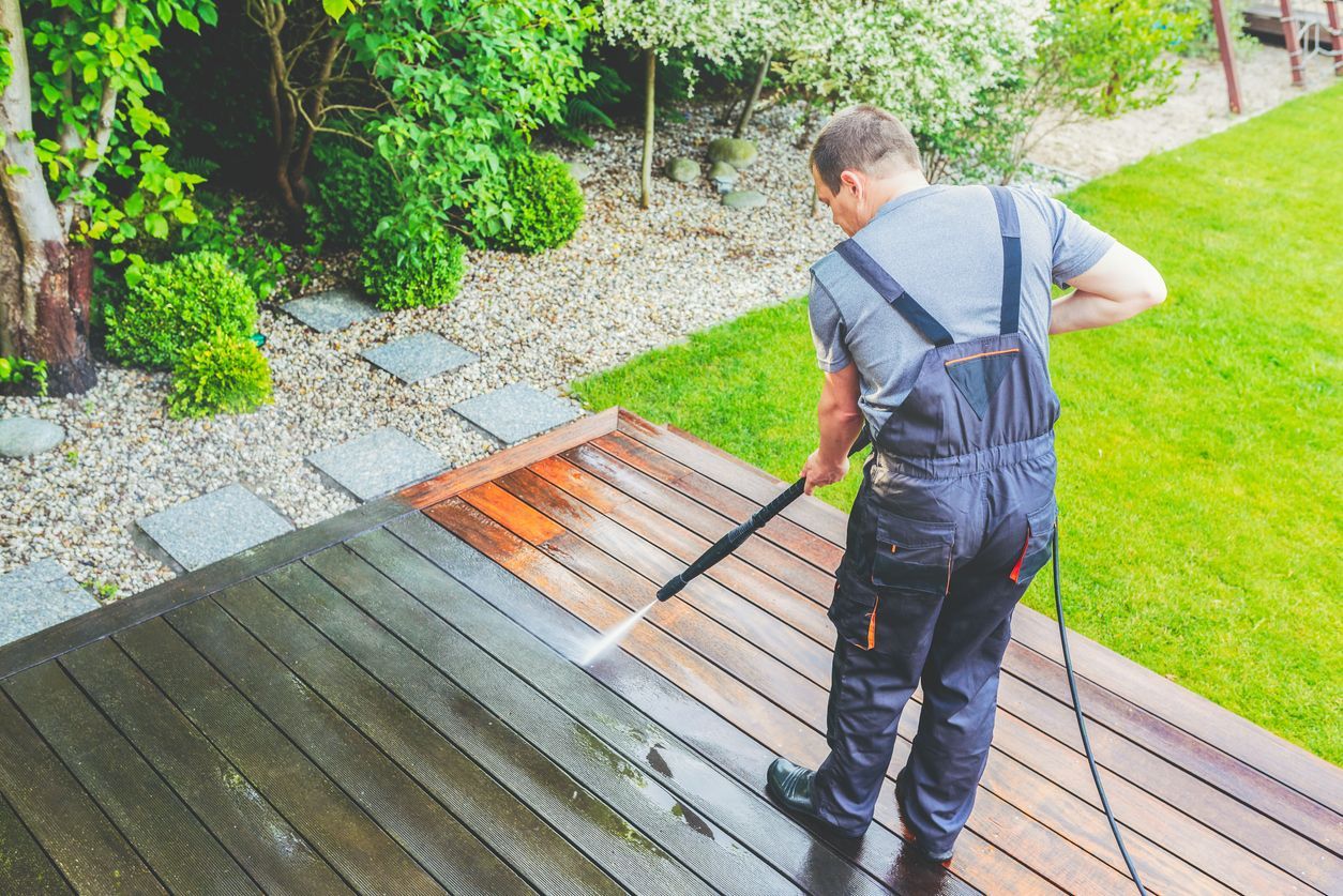 Cleaning terrace with a power washer