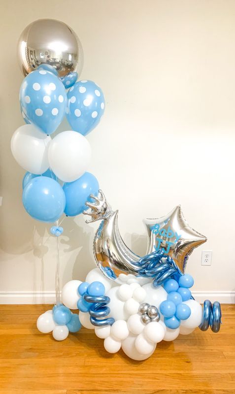 Balloons in gold and silver spell