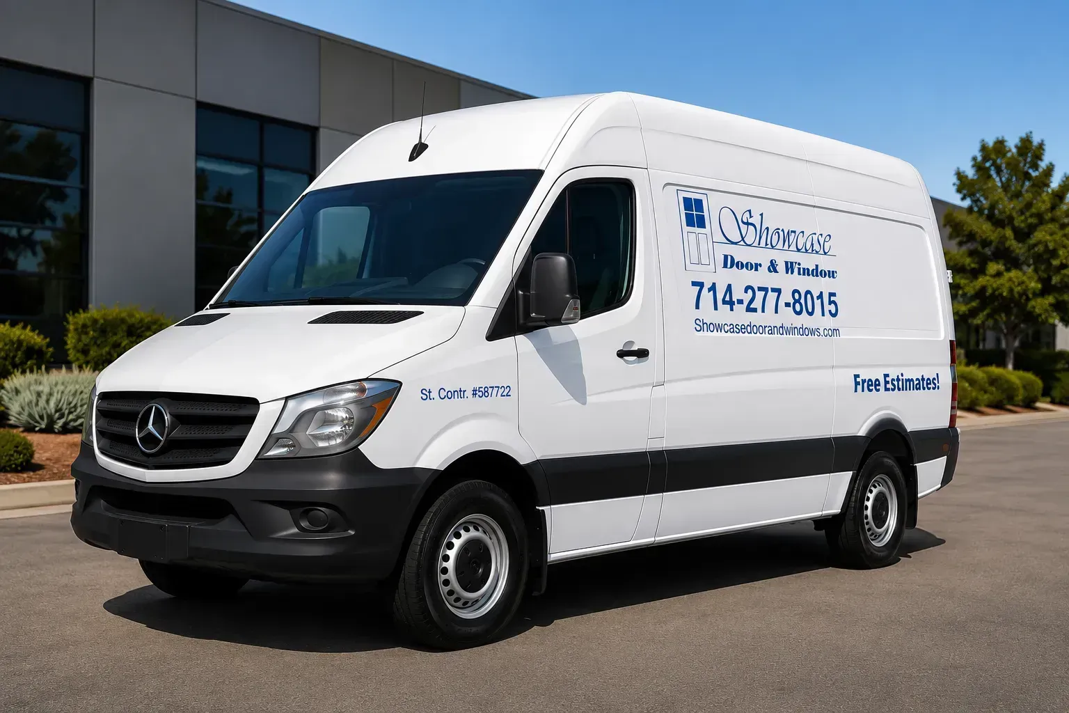 White Mercedes cargo van parked outside an office building with company logo and phone number on the side