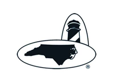 Black-and-white North Carolina state outline with a lighthouse in the background