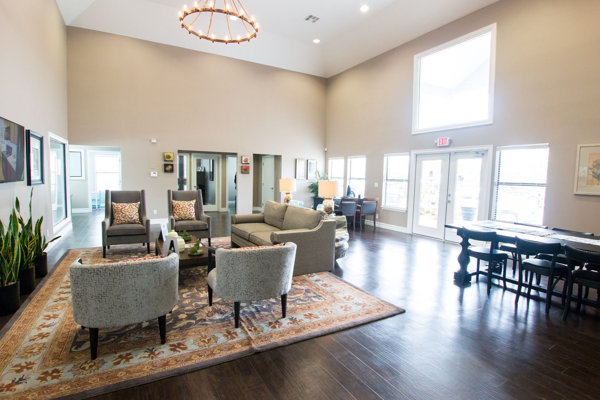 A living room filled with furniture and a pool table.