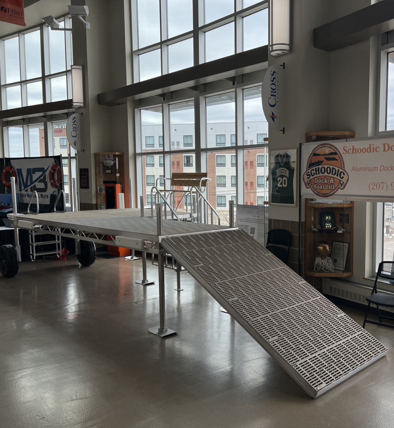 A large room with a ramp and a sign that says ' nb ' on it