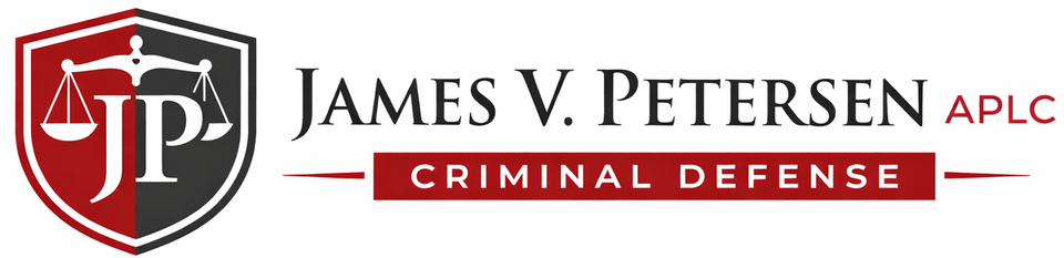 Logo for James V. Petersen APLC: a shield with scales of justice and the letters JP, next to the firm's name.