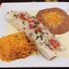 Burrito with pico de gallo, rice, and refried beans on a white plate. Burrito with pico de gallo, rice, and refried beans on a white plate.