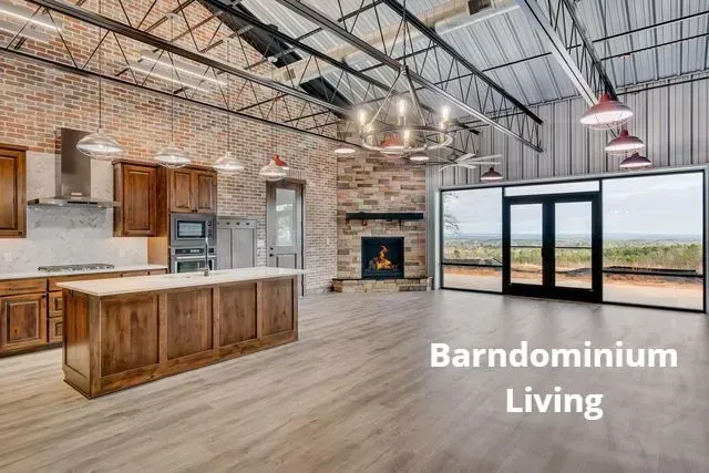 Modern barn home interior with kitchen, fireplace, and large glass doors
