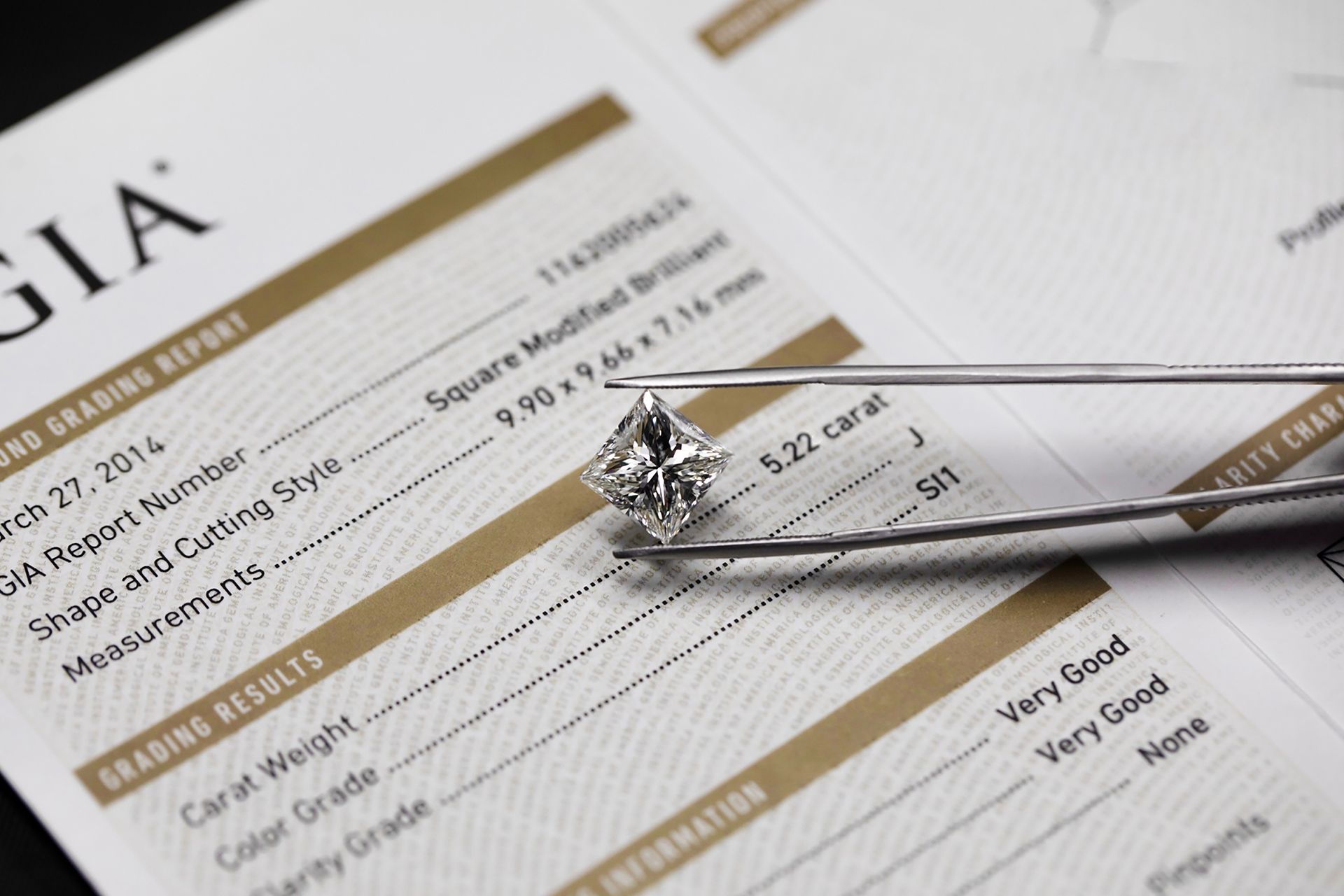 Diamond engagement ring on a jewelry appraisal form with gold accents