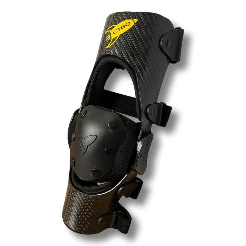 Black and Yellow Sports Knee Brace With Straps and Hard Cap — Gall Bros Medical in Robina, QLD