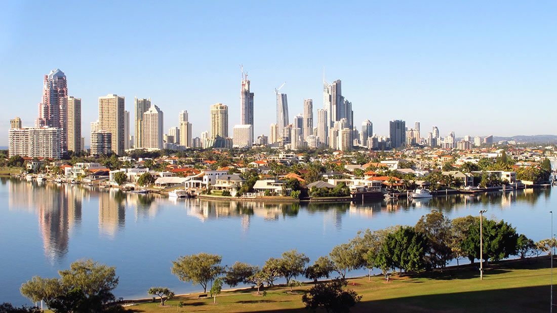 A City Skyline is Reflected in a Body of Water — Gall Bros Medical in Gold Coast, QLD