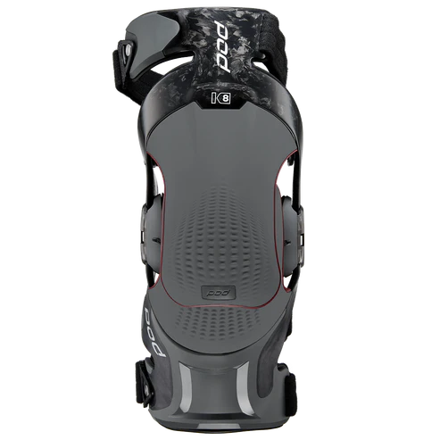 Black and Gray Sports Knee Brace With Side Straps — Gall Bros Medical in Robina, QLD