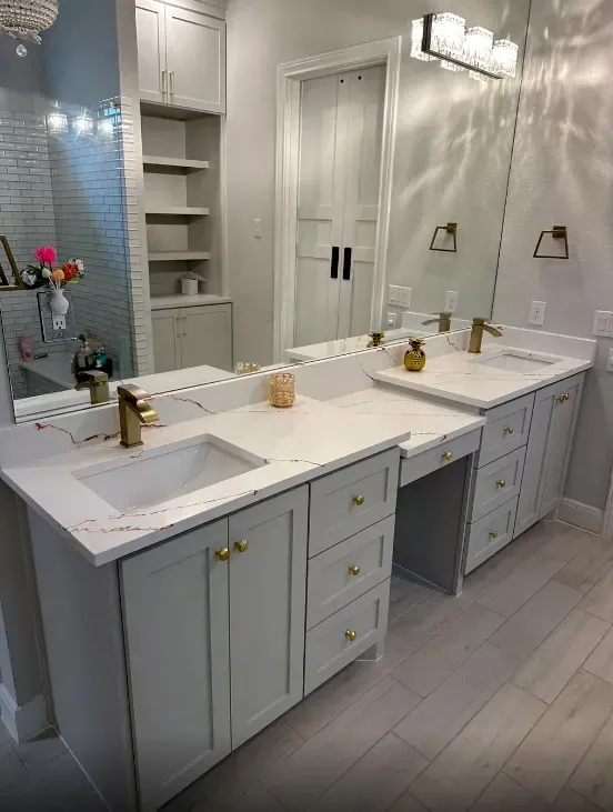A bathroom with two sinks and two mirrors.