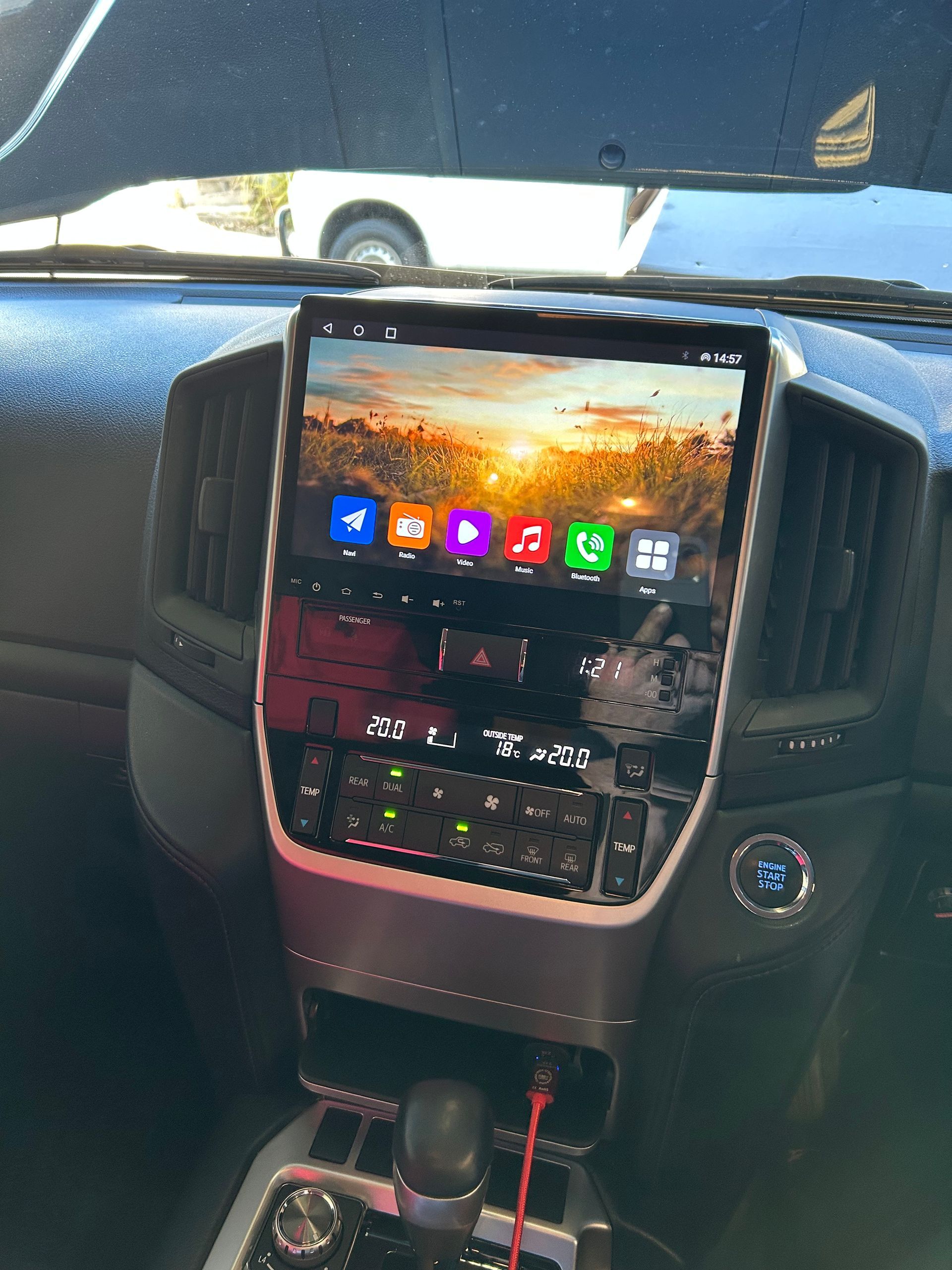 A Car Dashboard With A Screen That Says Charging On It — REM Auto Electrics In Cardiff, NSW