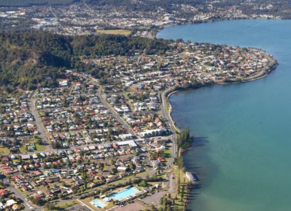 An Aerial View Of A City Next To A Body Of Water — REM Auto Electrics In Lake Macquarie, NSW