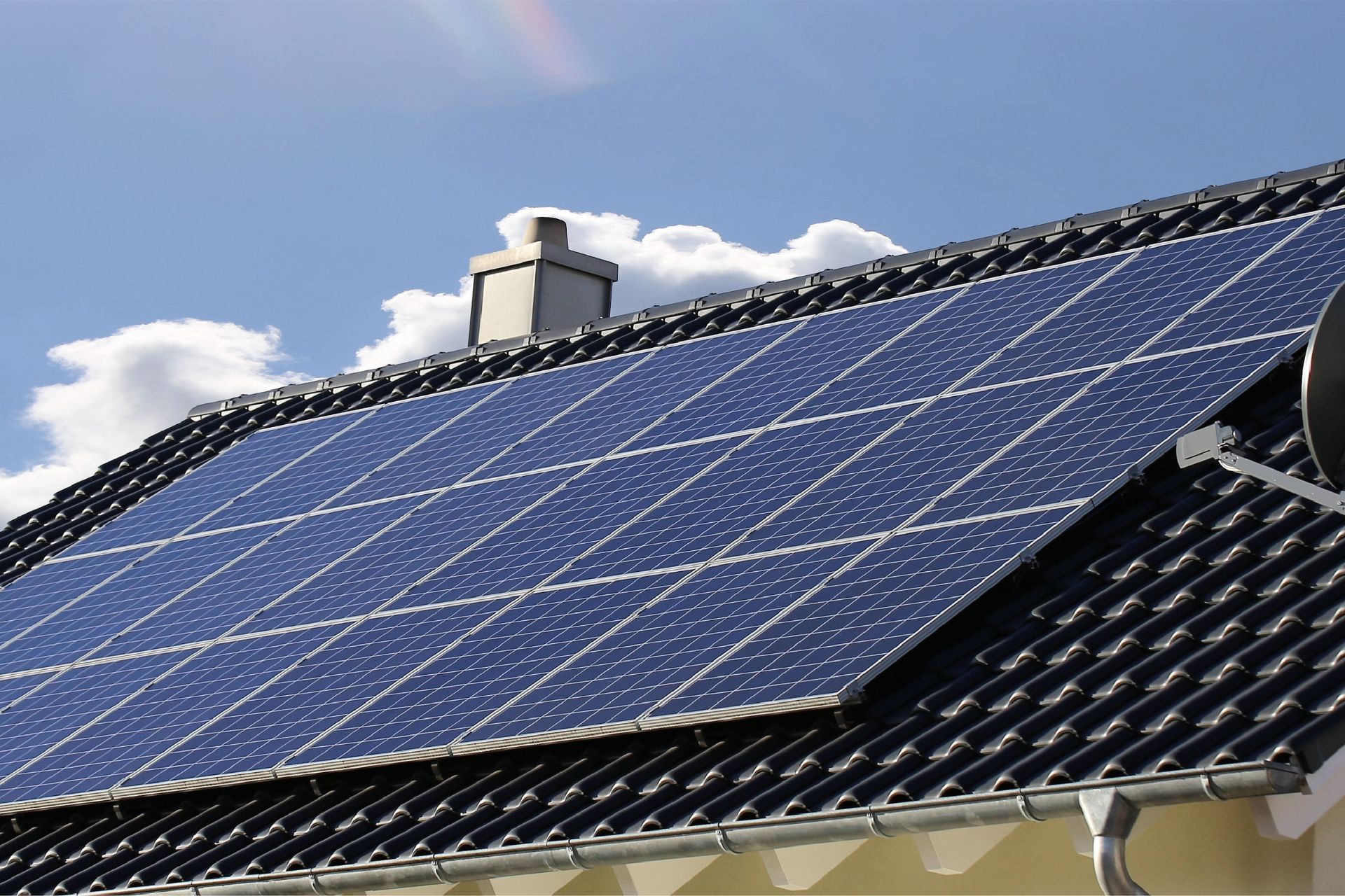 a roof with a lot of solar panels on it