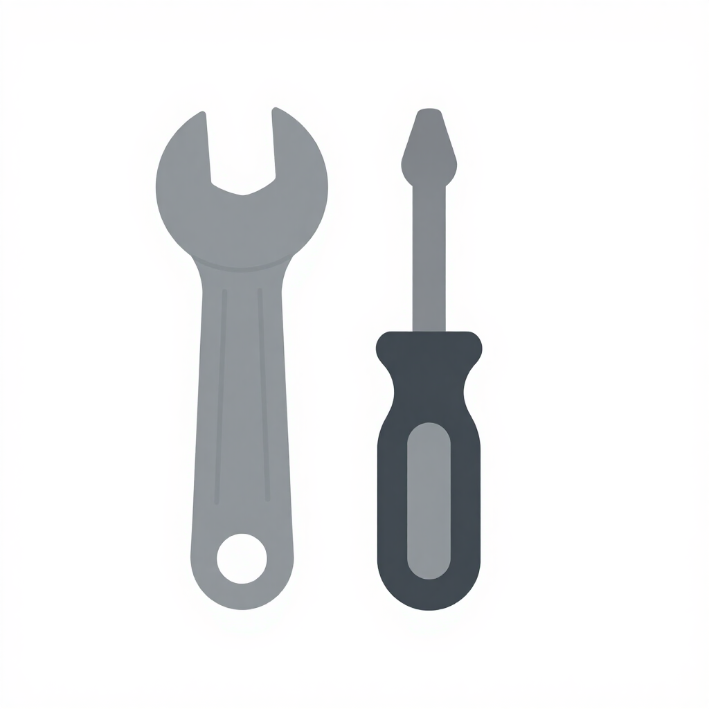 Iconos de llave inglesa gris y destornillador negro sobre un fondo blanco.