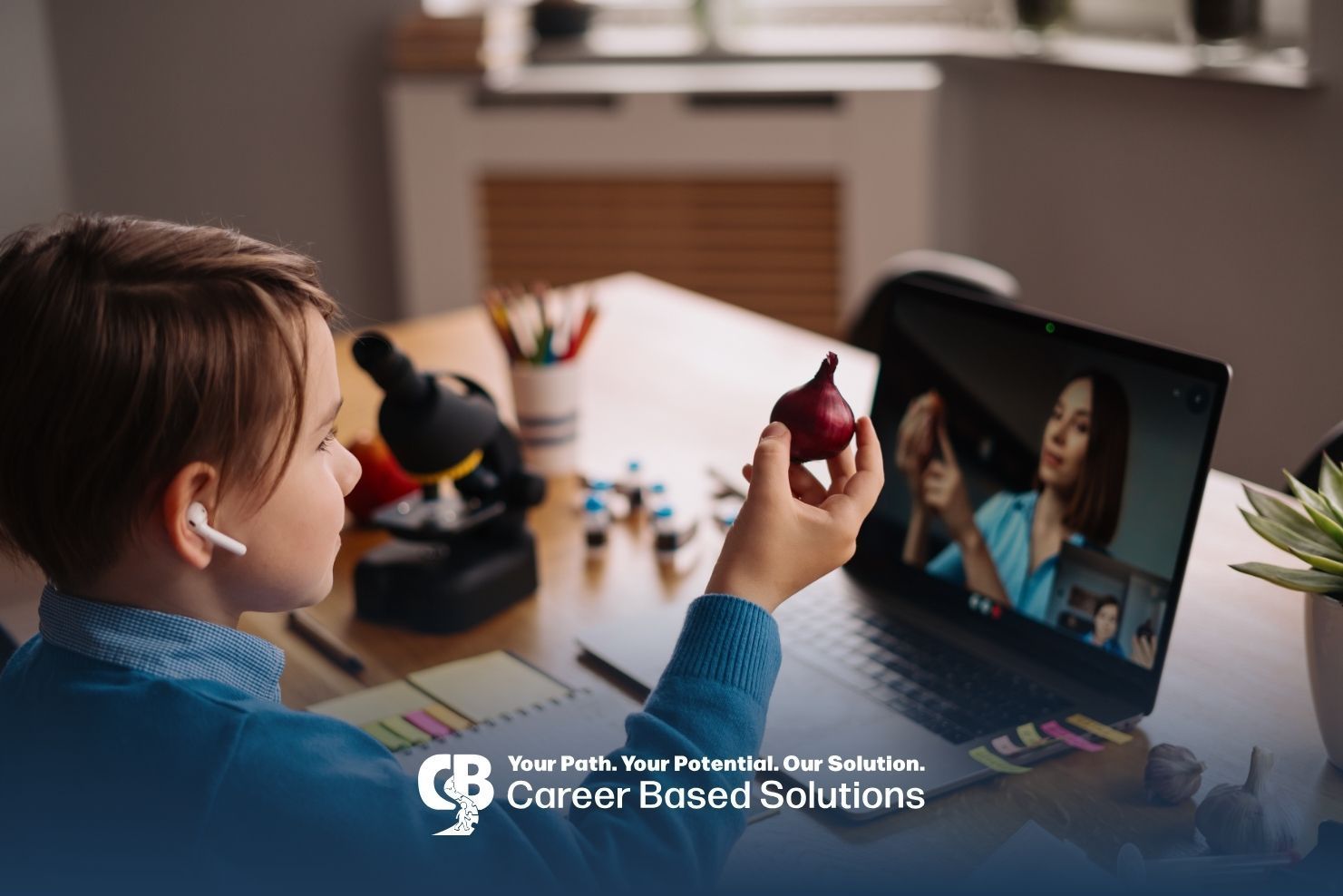 Autistic child joins virtual therapy on laptop, practicing communication skills with home support.
