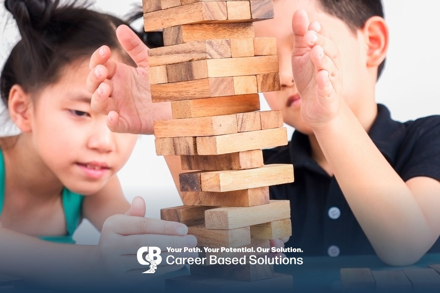 Autistic kids collaborate on a wooden block tower, practicing problem-solving through structured ABA