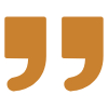 Two large, tan-colored quotation marks centered on a white background.