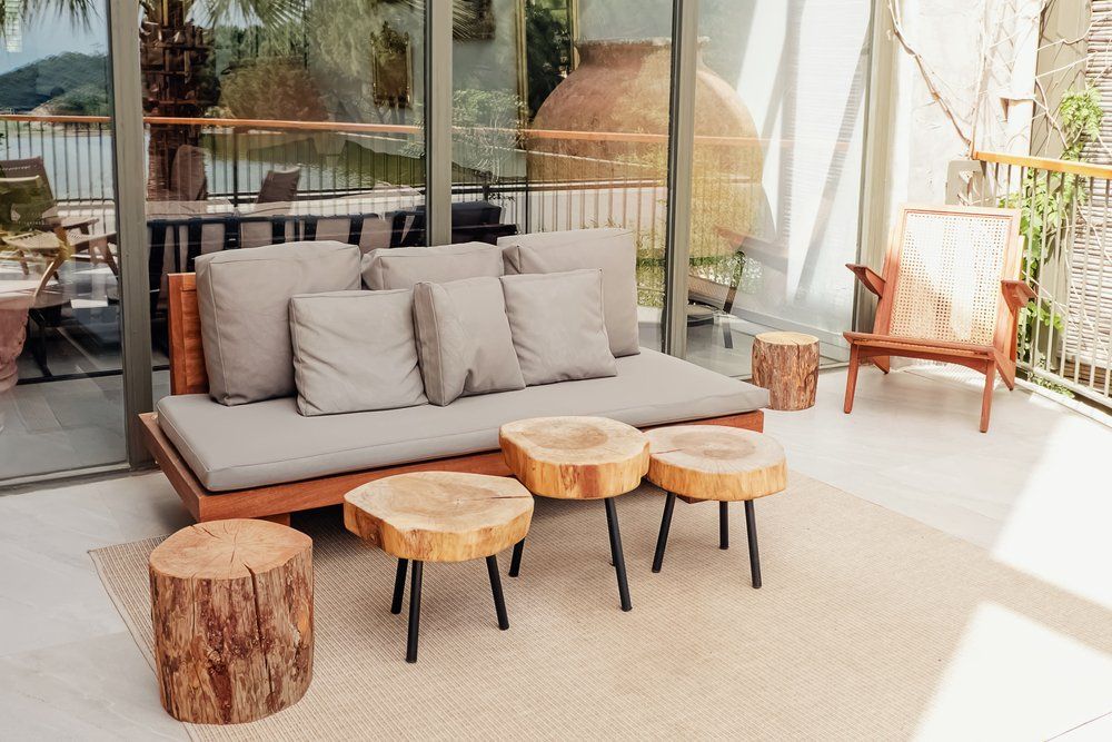 sofa with wooden chairs